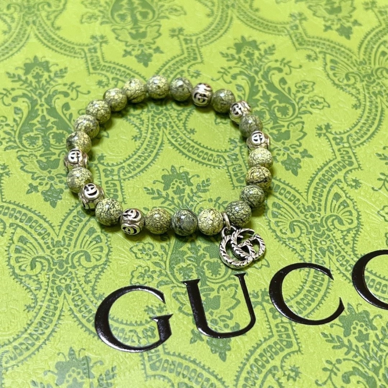 G*u*i bracelets
